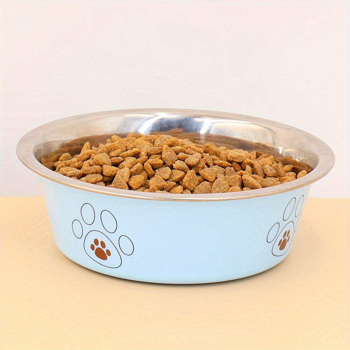 Stainless Steel Dog Bowl with Cute Footprint Pattern Durable Non-Slip Pet Food Water Bowl for Dogs Indoor Outdoor Use Sizes S M L XL Colors Beige Pink Blue